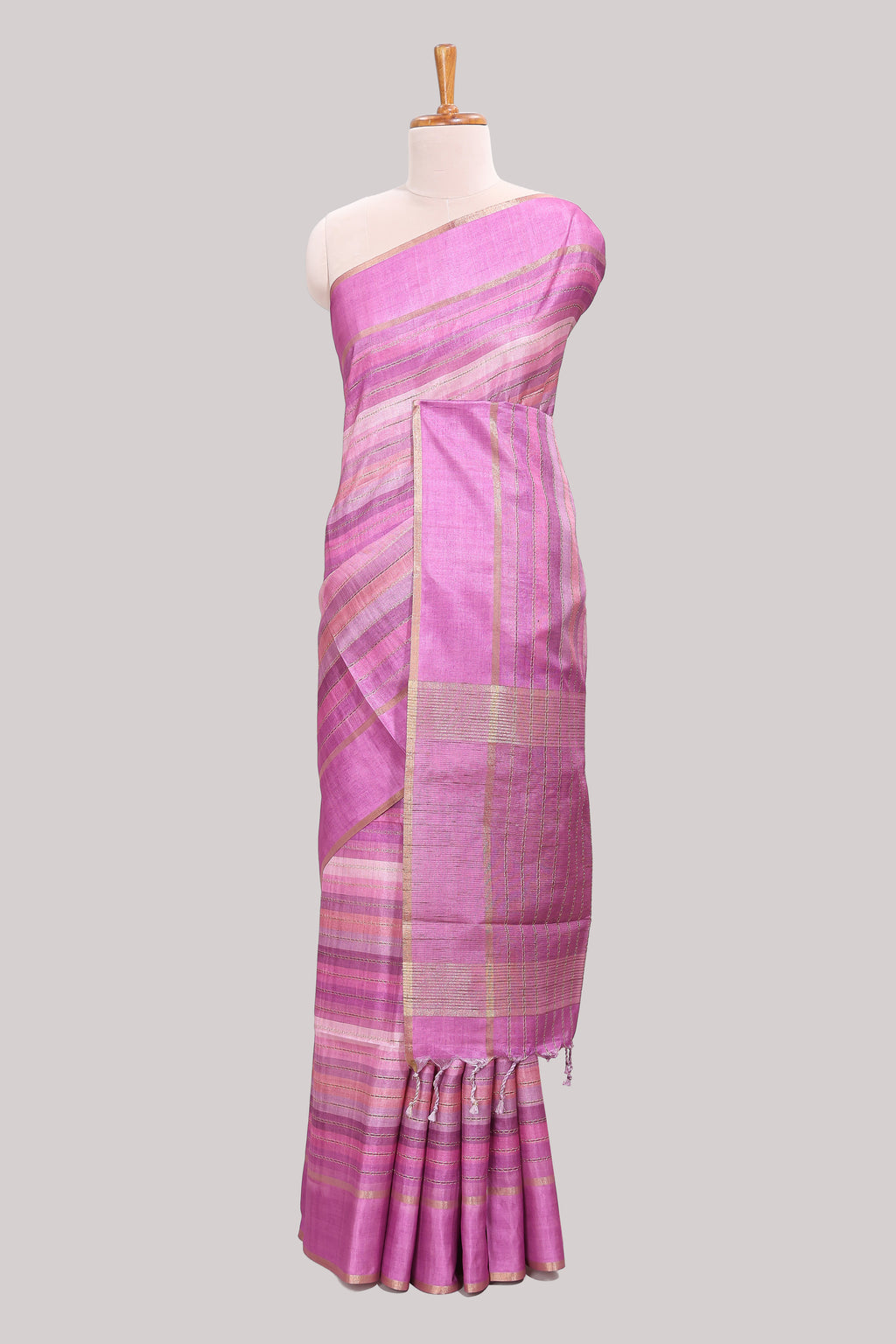 Pink striped tussar saree with self border and pallu that comes with matching blouse