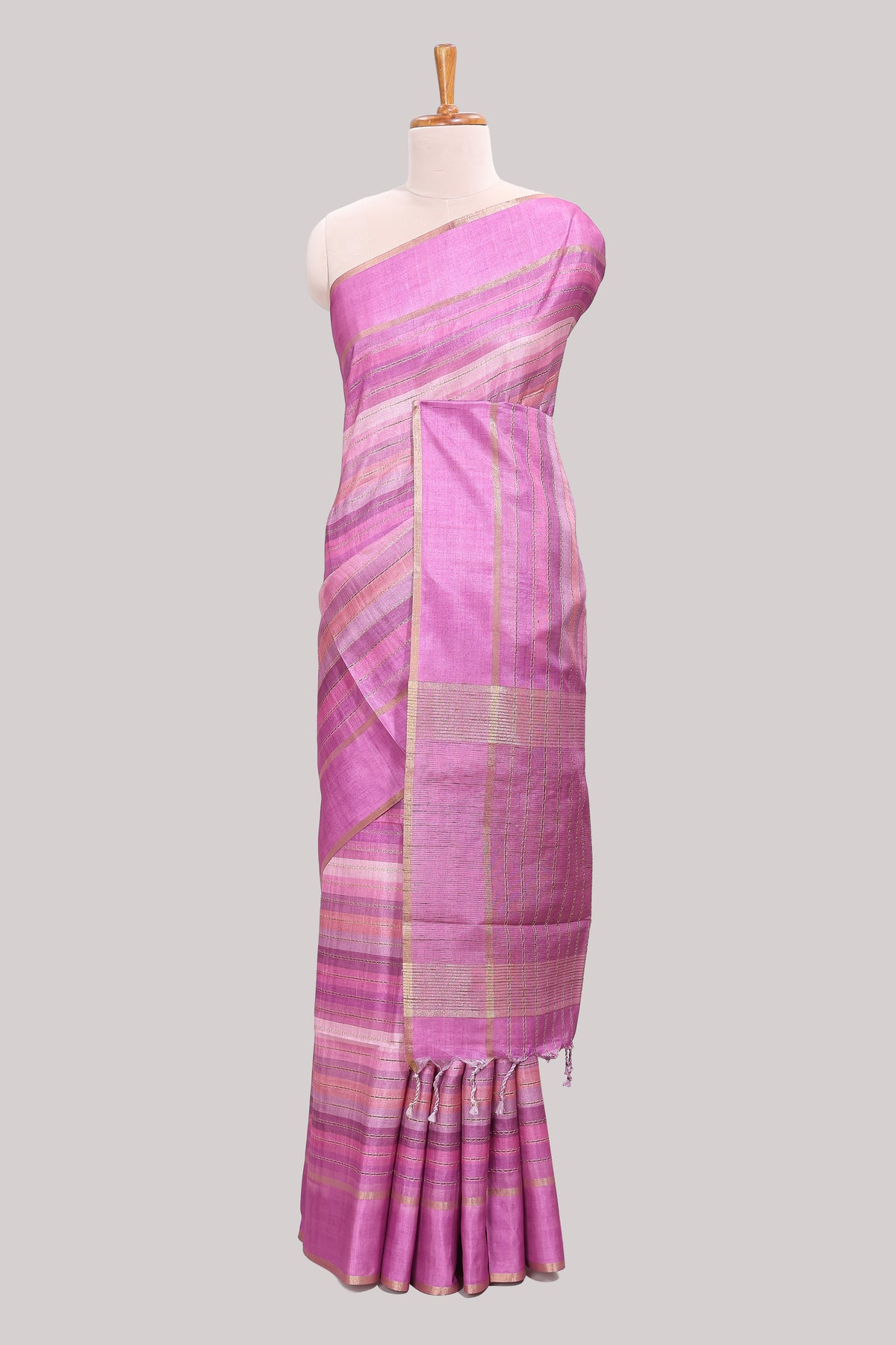 Pink striped tussar saree with self border and pallu that comes with matching blouse