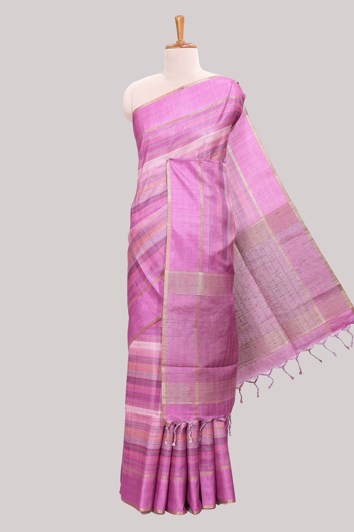 Pink striped tussar saree with self border and pallu that comes with matching blouse