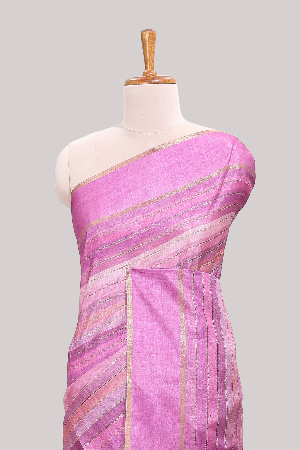 Pink striped tussar saree with self border and pallu that comes with matching blouse