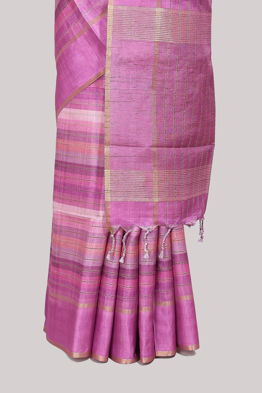 Pink striped tussar saree with self border and pallu that comes with matching blouse