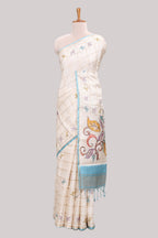 Off white checked tussar saree with contrast border and self pallu that comes with matching blouse