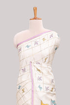Off white checked tussar saree with contrast border and self pallu that comes with matching floral blouse