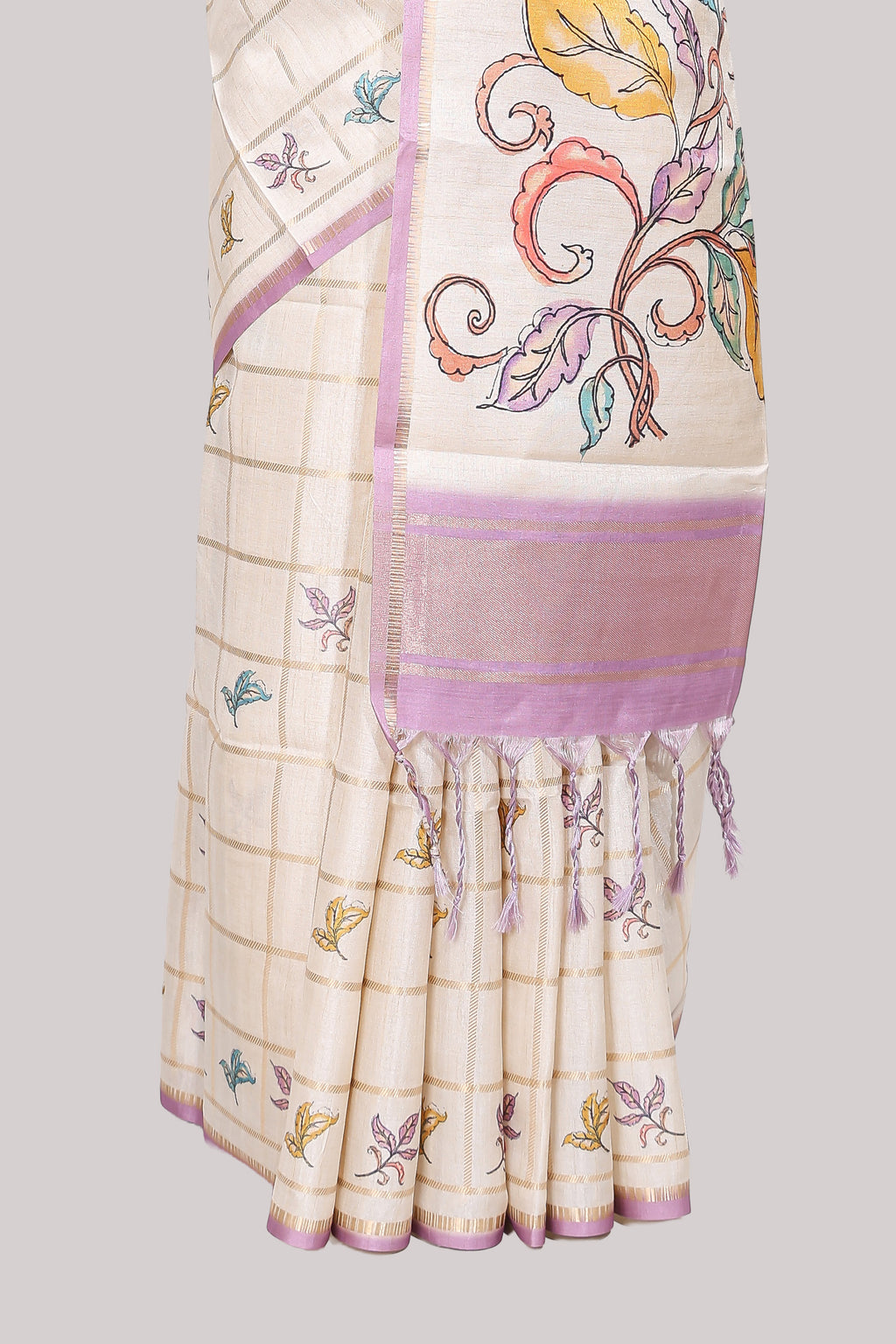 Off white checked tussar saree with contrast border and self pallu that comes with matching floral blouse