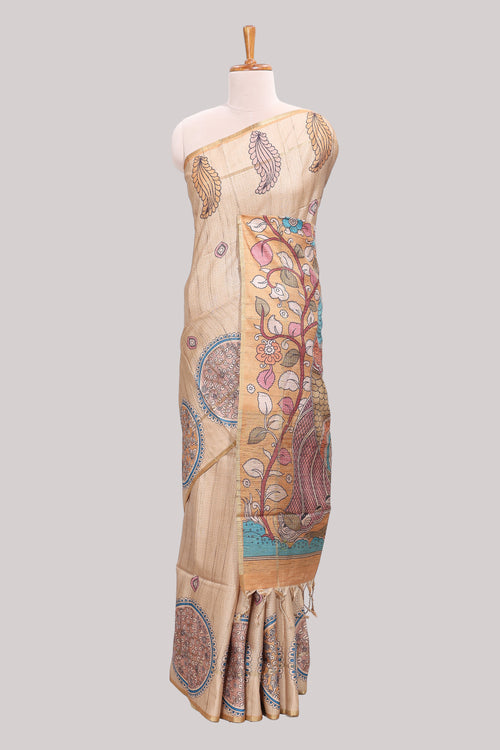 Beige floral tussar saree with self border and pallu that comes with matching plain blouse