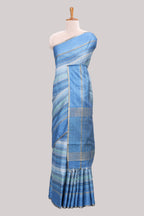 Blue striped tussar saree with self border and pallu that comes with matching blouse