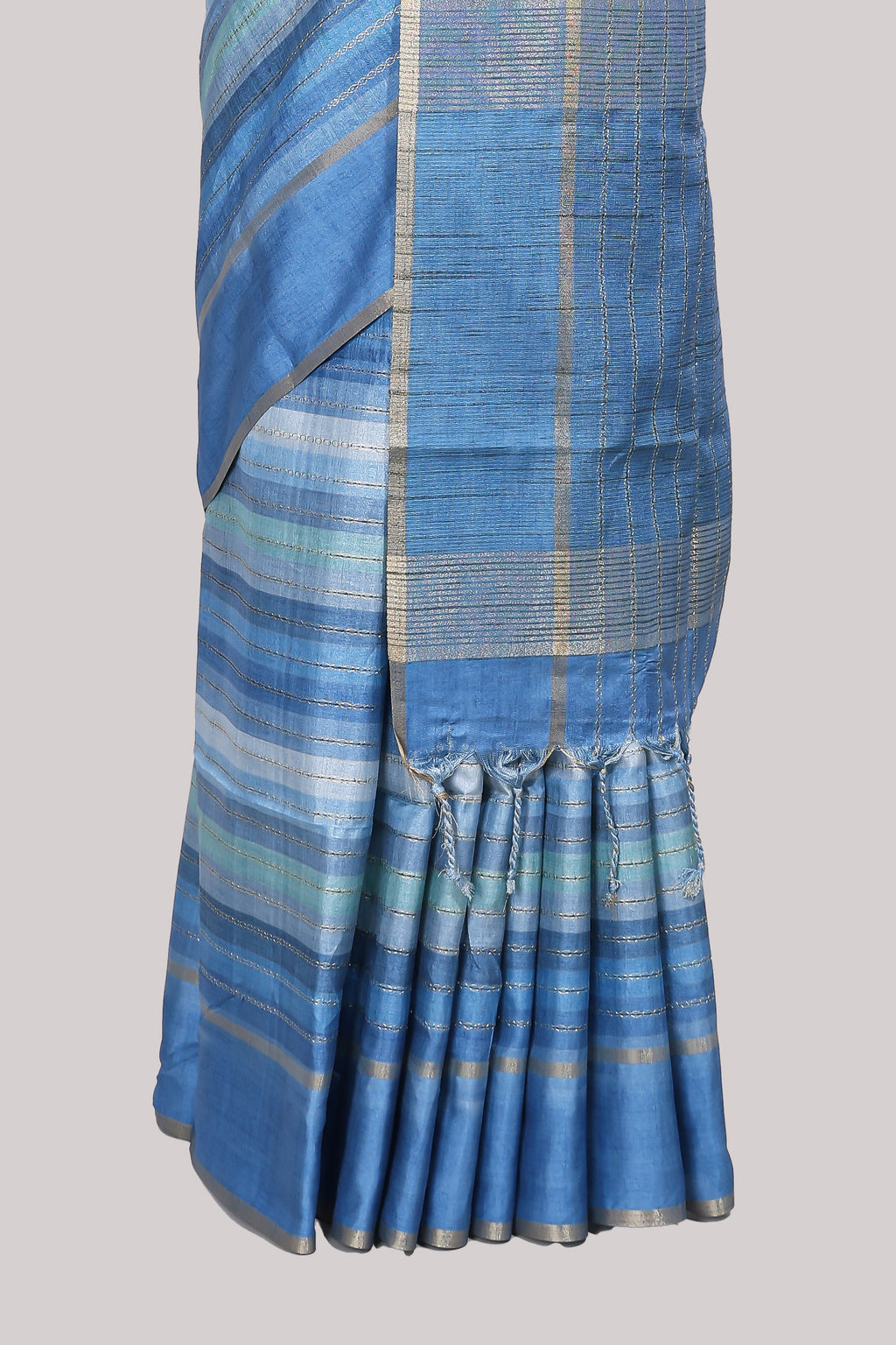 Blue striped tussar saree with self border and pallu that comes with matching blouse