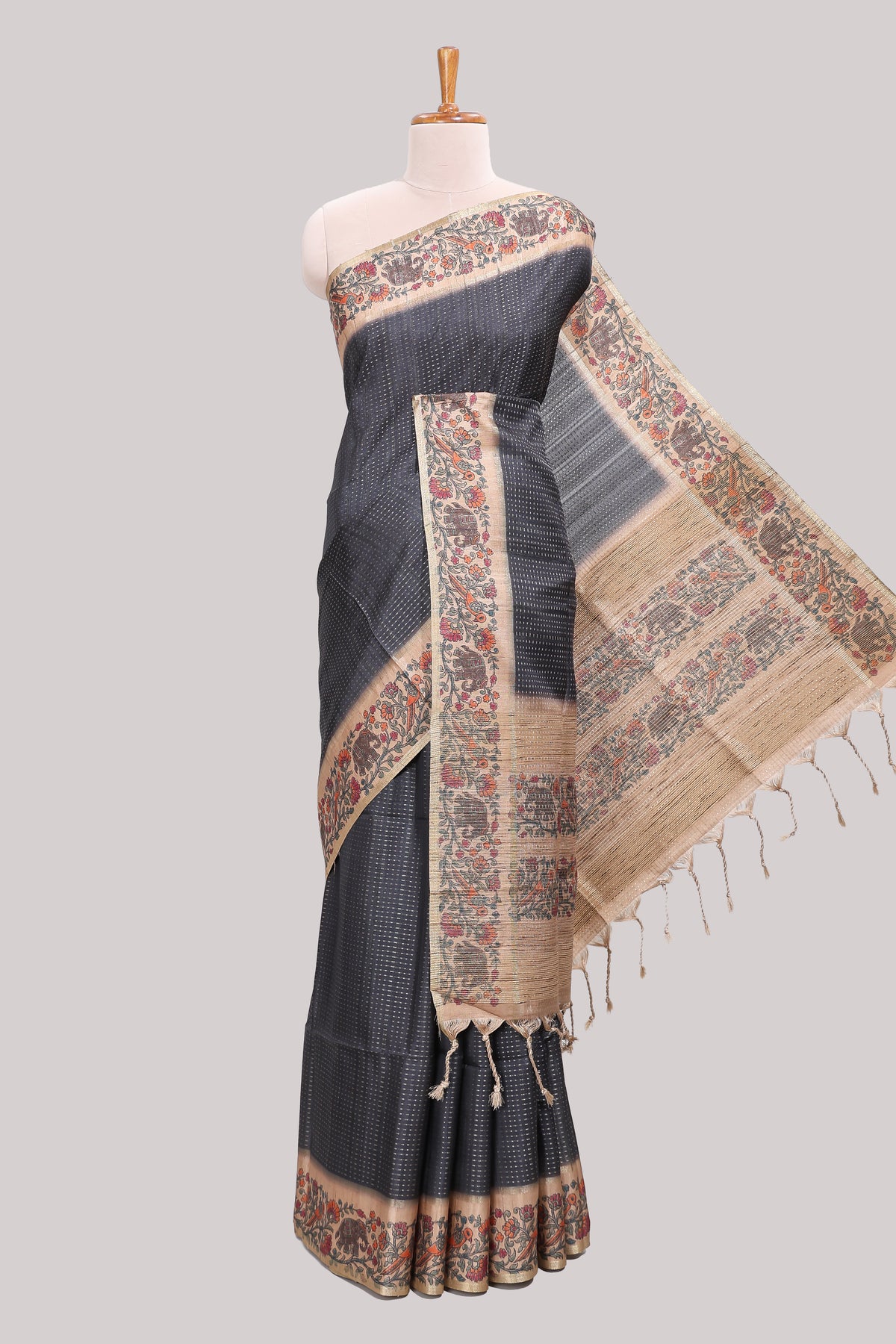 Black striped tussar saree with contrast border and pallu that comes with plain blouse