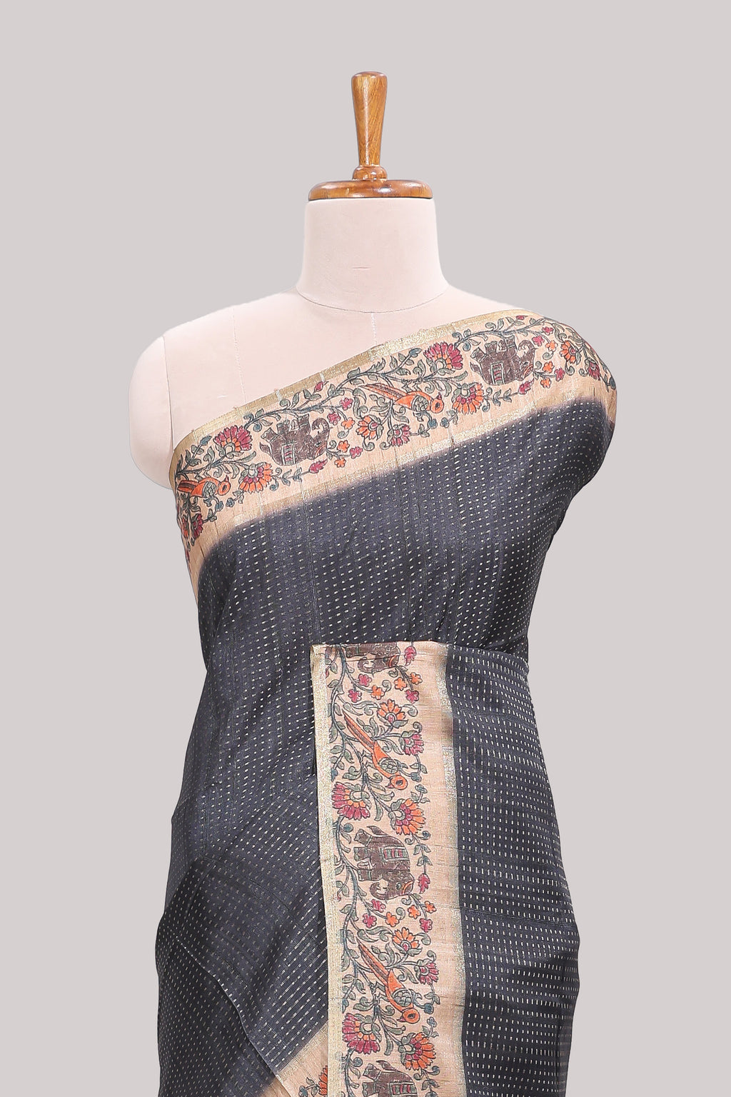 Black striped tussar saree with contrast border and pallu that comes with plain blouse