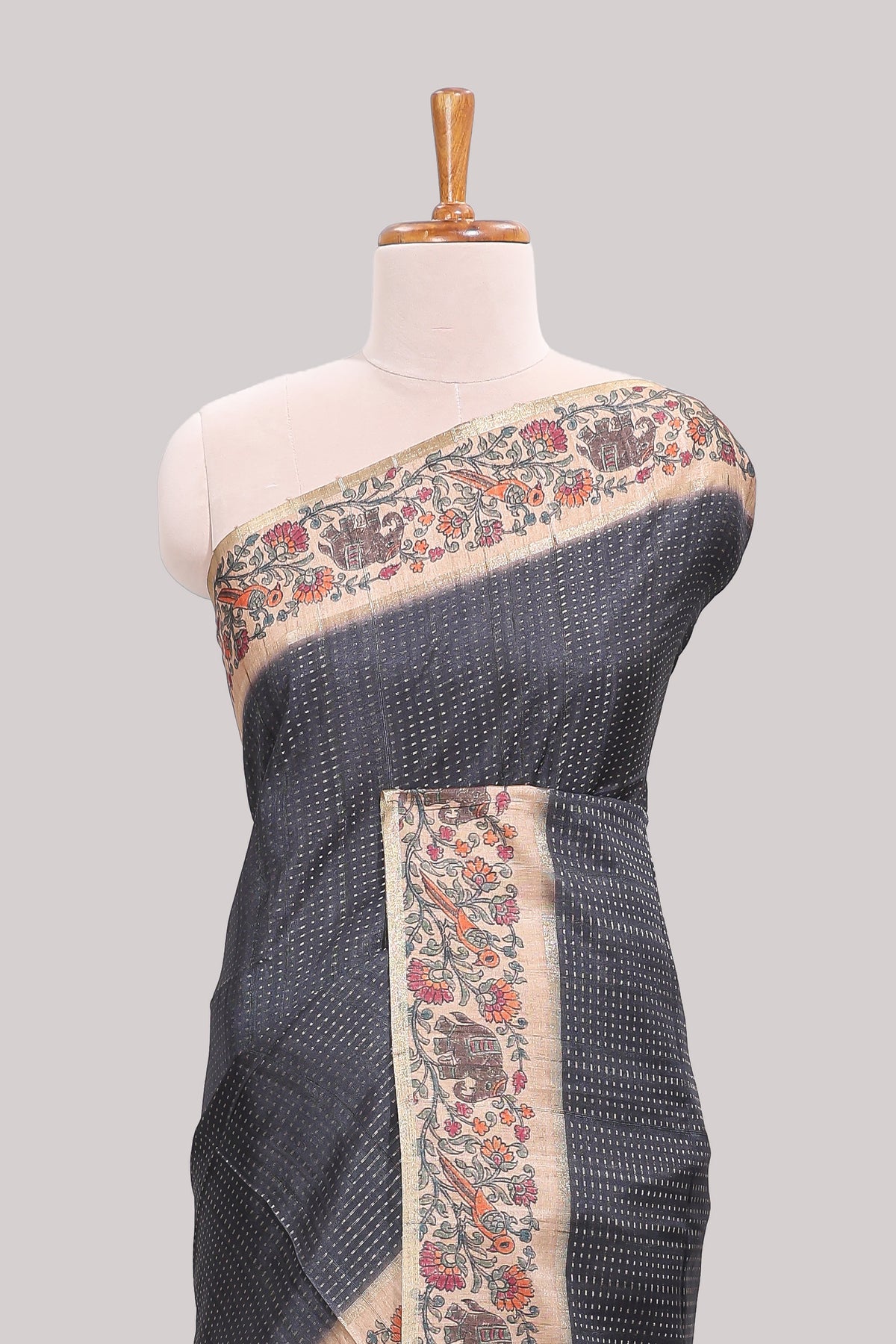 Black striped tussar saree with contrast border and pallu that comes with plain blouse