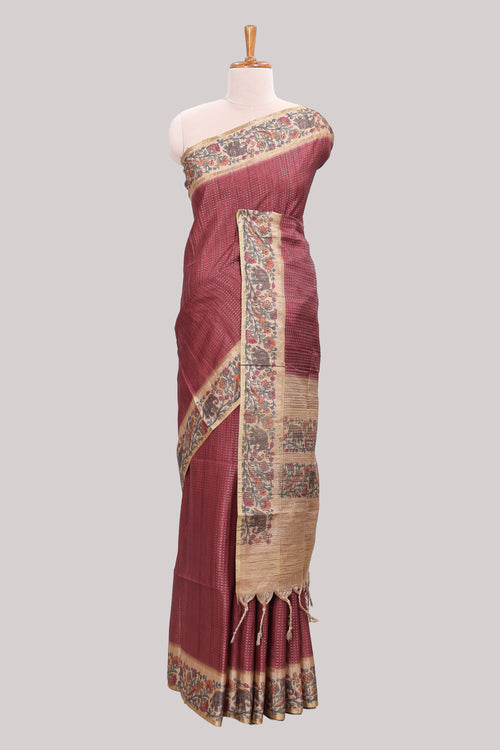 Maroon striped tussar saree with contrast border and pallu that comes with plain blouse