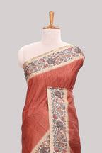 Rust striped tussar saree with contrast border and pallu that comes with plain blouse