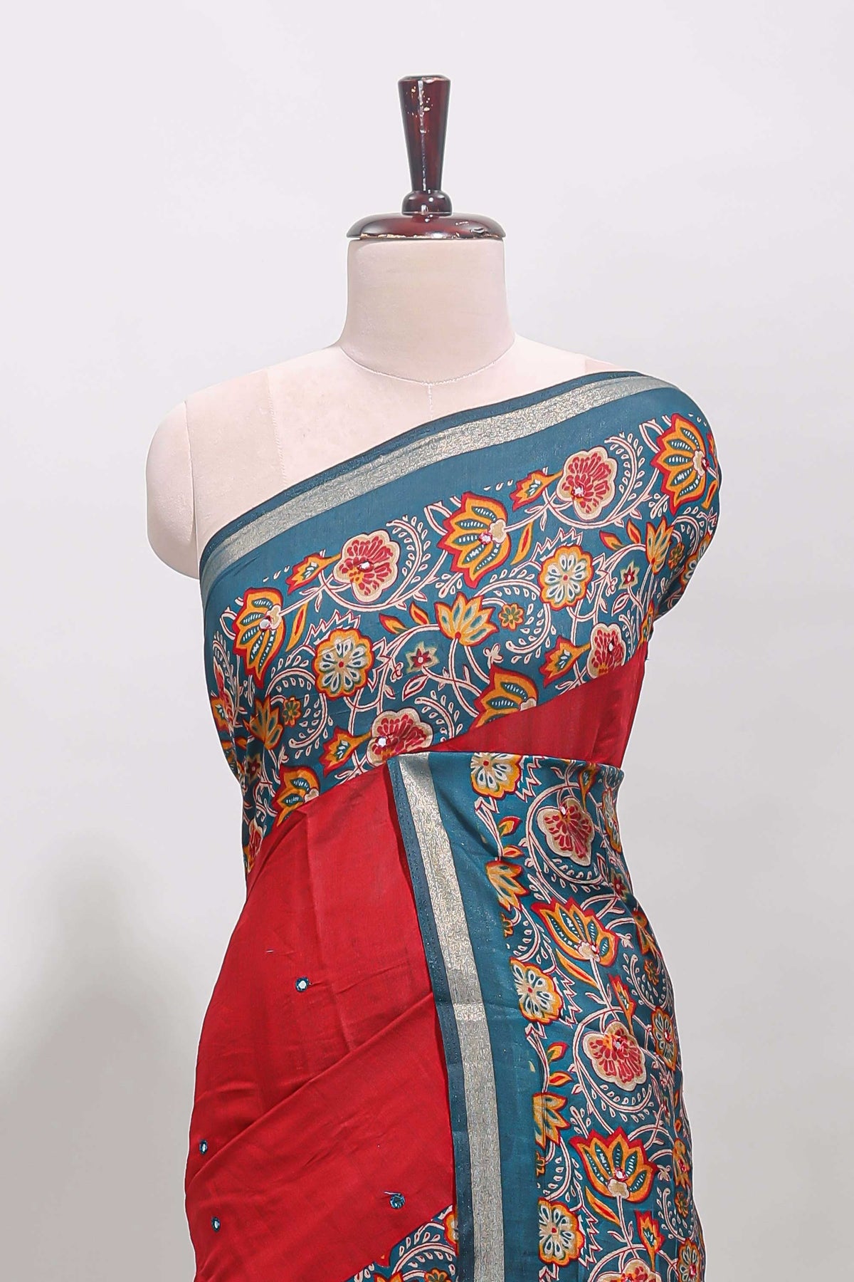 Maroon embroidery mirror work viscose georgette saree with contrast floral vine zari border and printed blouse
