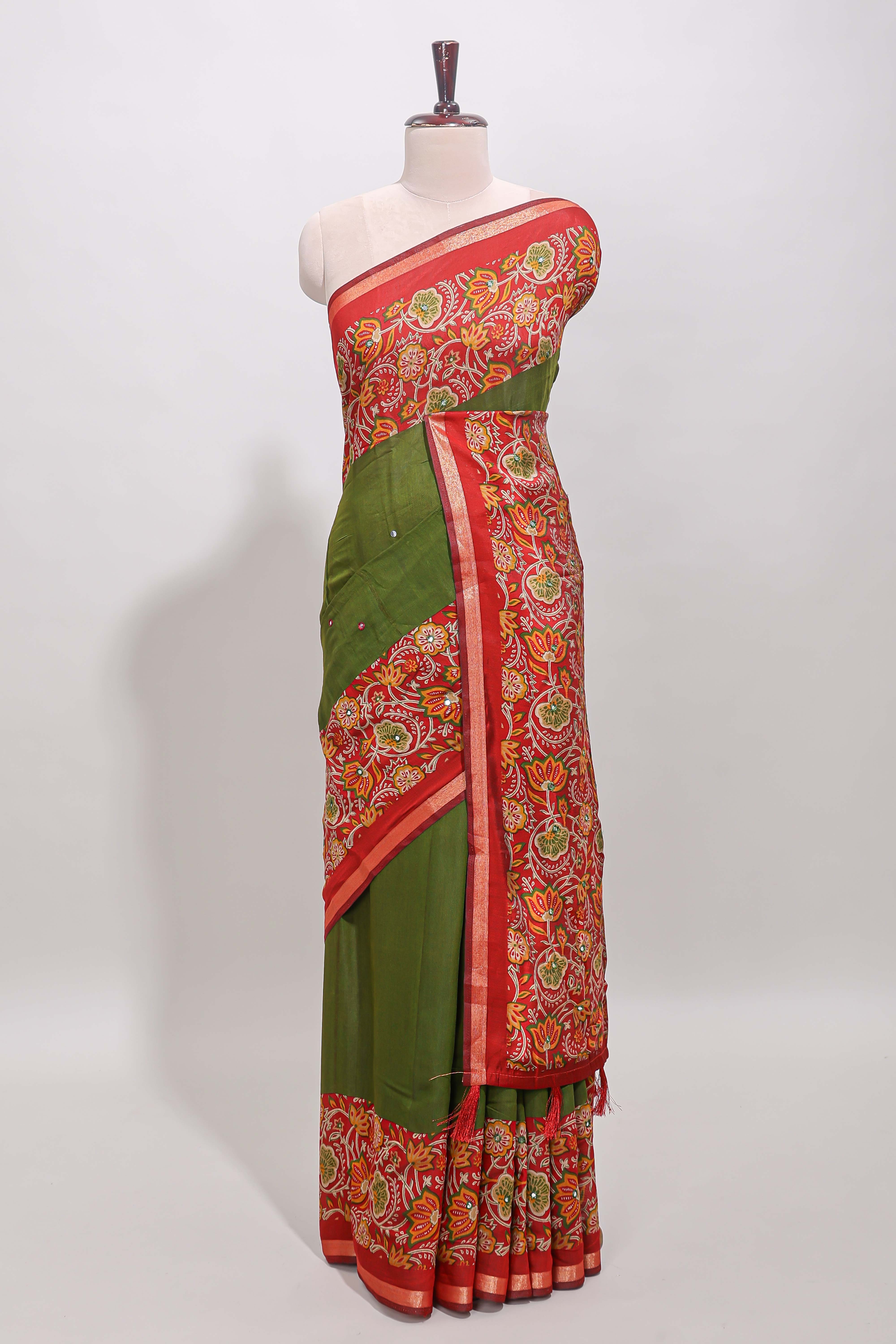 Green embroidery mirror work viscose georgette saree with contrast floral vine zari border and printed blouse