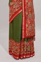 Green embroidery mirror work viscose georgette saree with contrast floral vine zari border and printed blouse