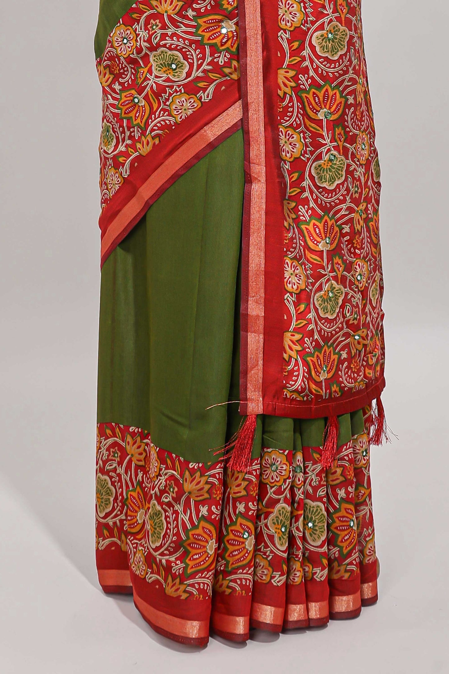 Green embroidery mirror work viscose georgette saree with contrast floral vine zari border and printed blouse