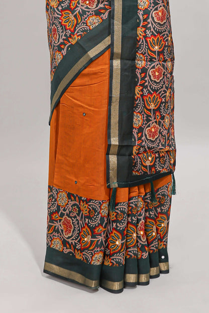Mustard yellow embroidery mirror work viscose georgette saree with contrast floral vine zari border and printed blouse
