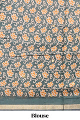 Mustard yellow embroidery mirror work viscose georgette saree with contrast floral vine zari border and printed blouse