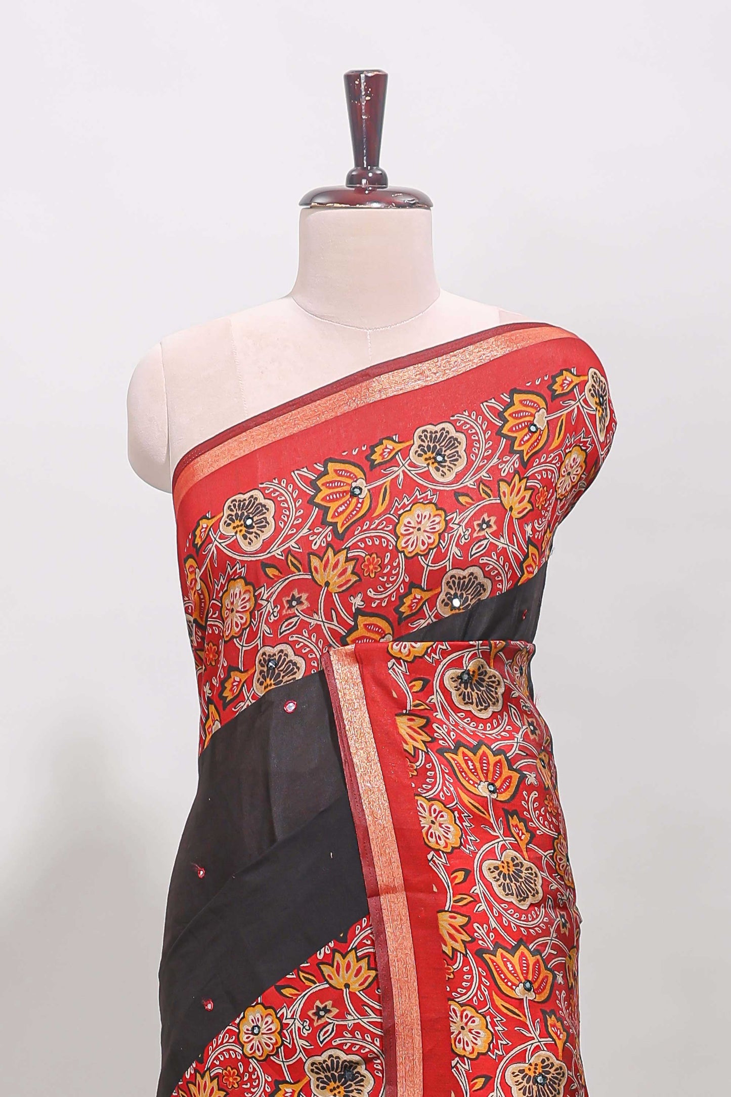 Black embroidery mirror work viscose georgette saree with contrast floral vine zari border and printed blouse
