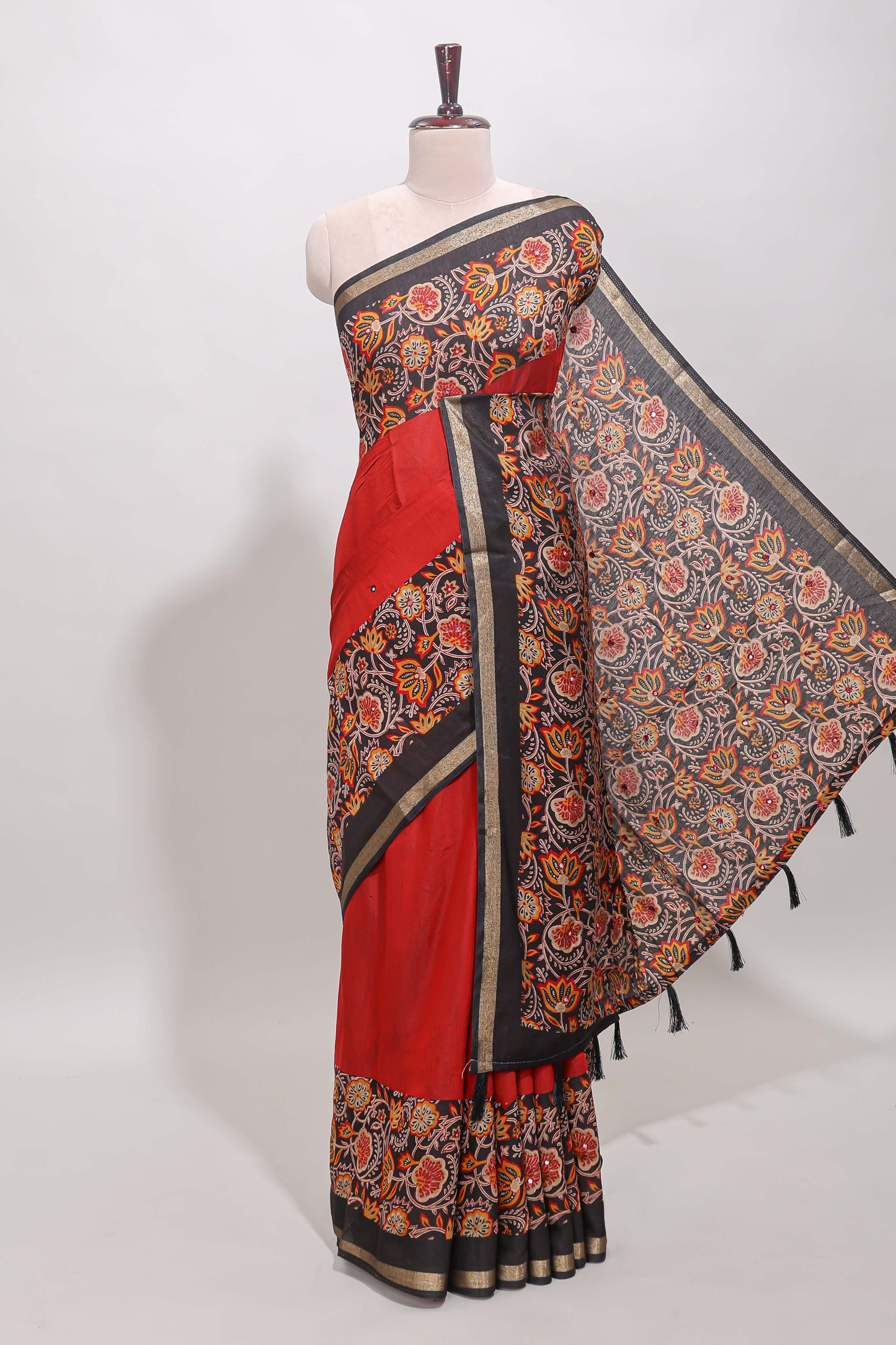 Red embroidery mirror work viscose georgette saree with contrast floral vine zari border and printed blouse