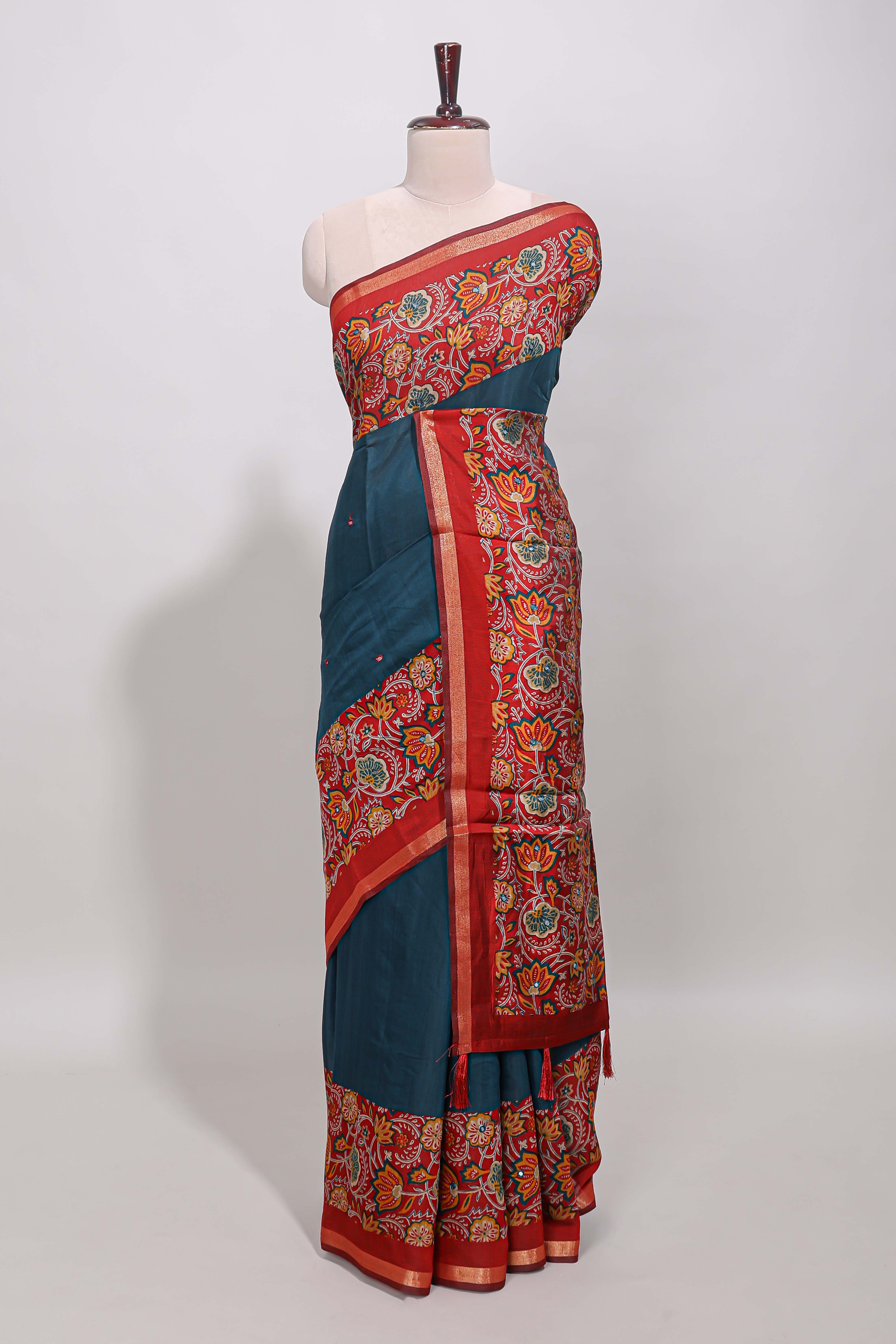 Blue embroidery mirror work viscose georgette saree with contrast floral vine zari border and printed blouse