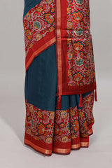 Blue embroidery mirror work viscose georgette saree with contrast floral vine zari border and printed blouse