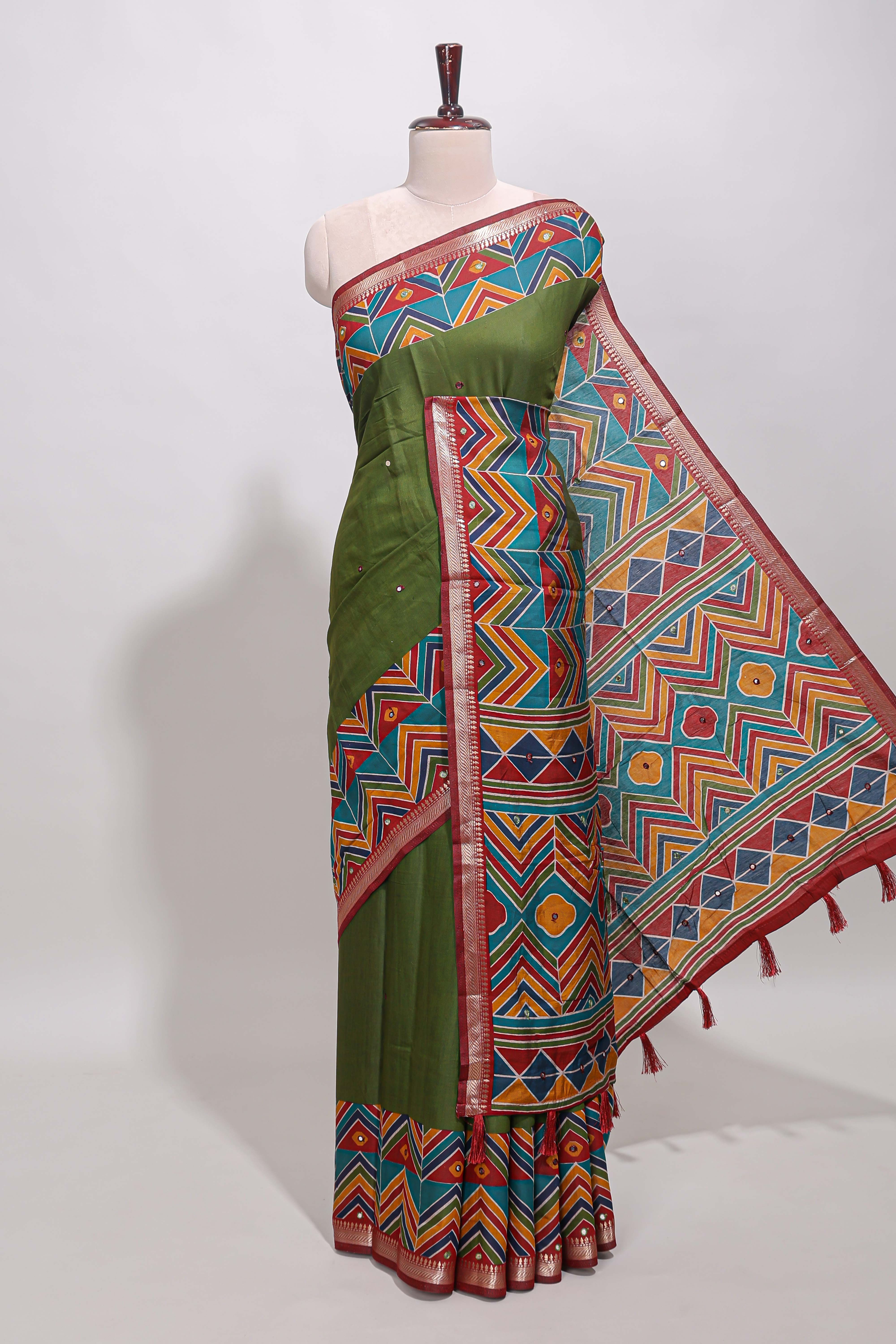 Green embroidery mirror work viscose georgette saree with contrast chevron design zari border and printed pallu