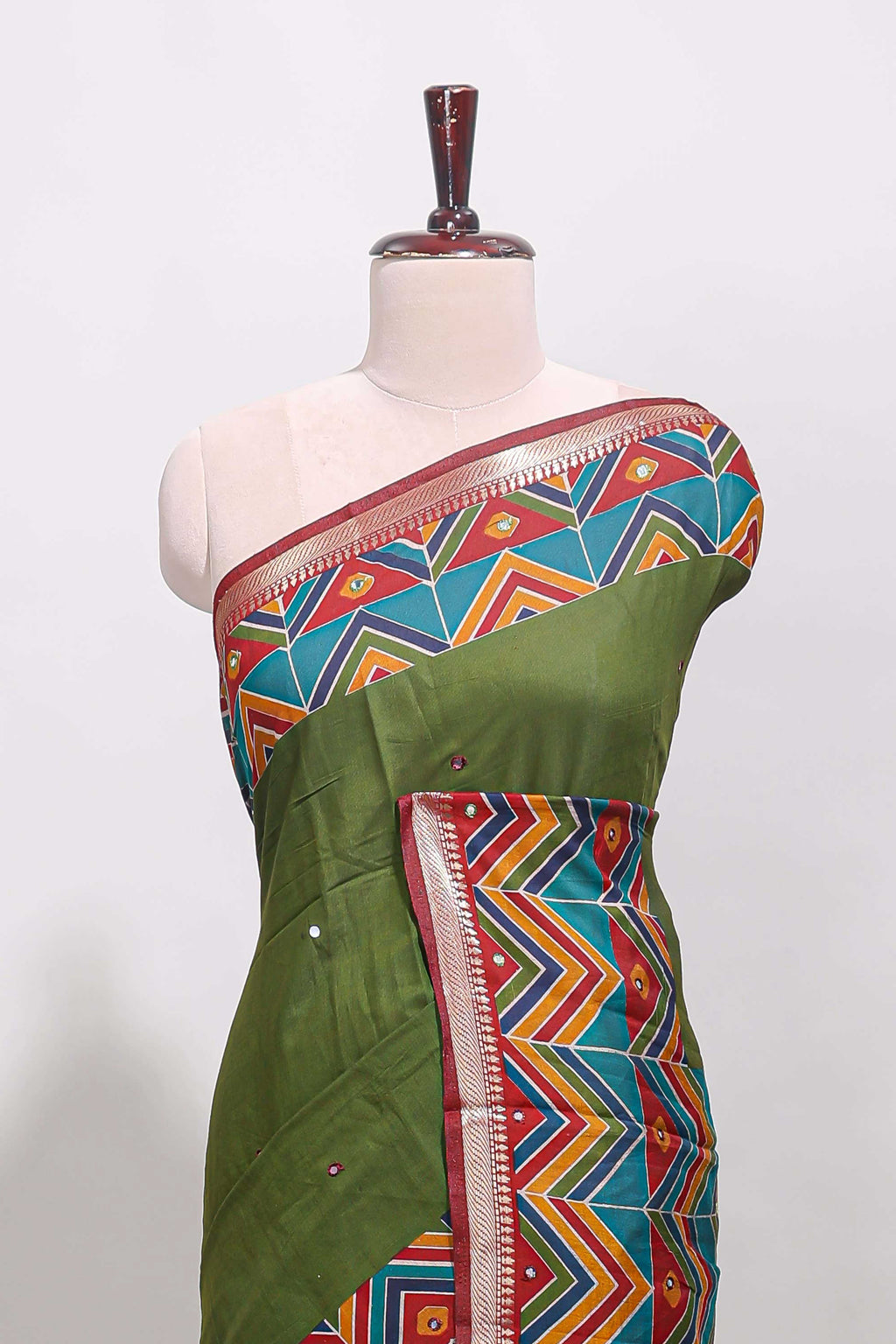 Green embroidery mirror work viscose georgette saree with contrast chevron design zari border and printed pallu