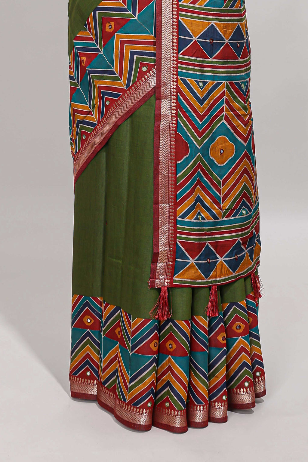 Green embroidery mirror work viscose georgette saree with contrast chevron design zari border and printed pallu