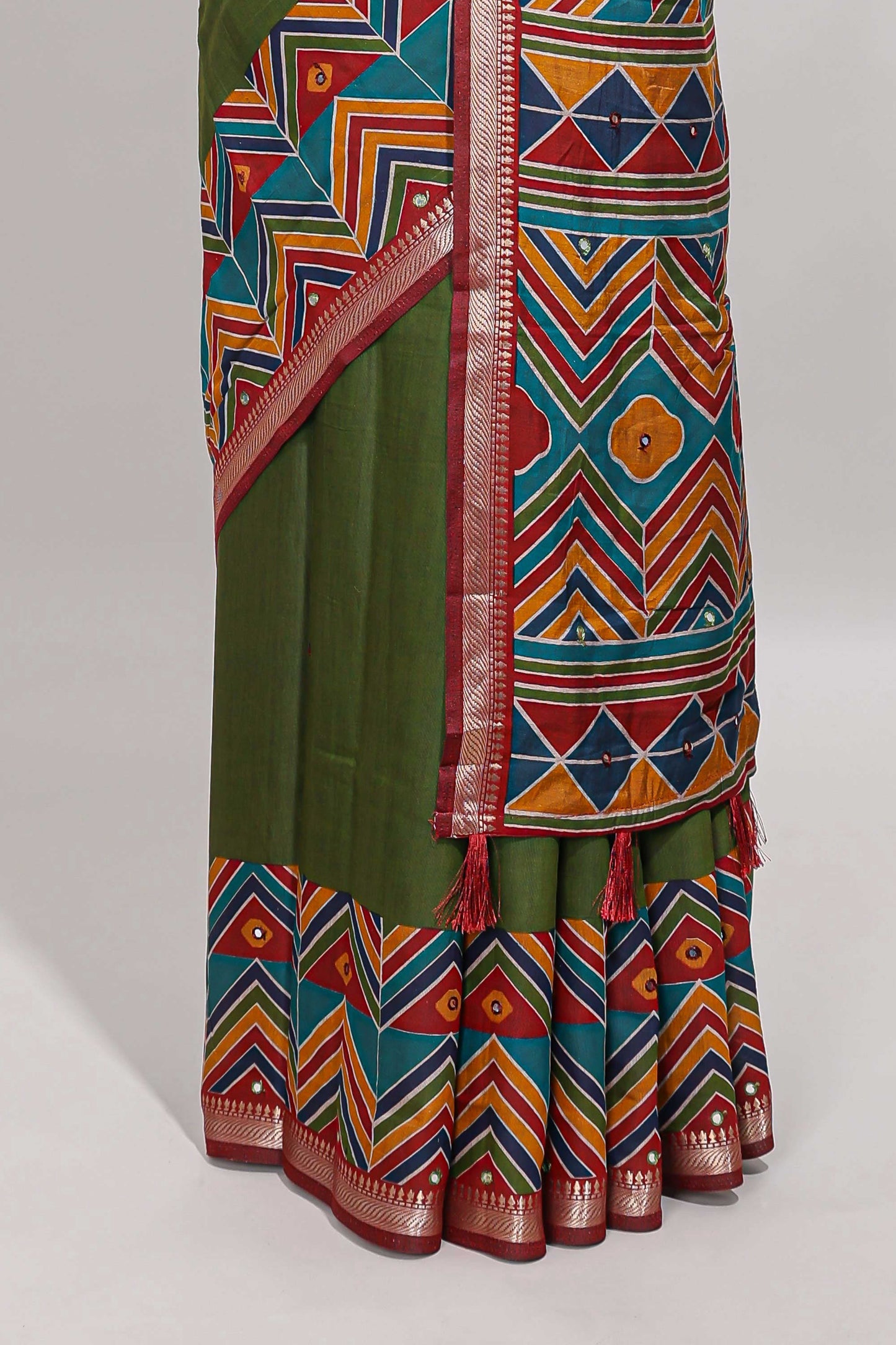 Green embroidery mirror work viscose georgette saree with contrast chevron design zari border and printed pallu