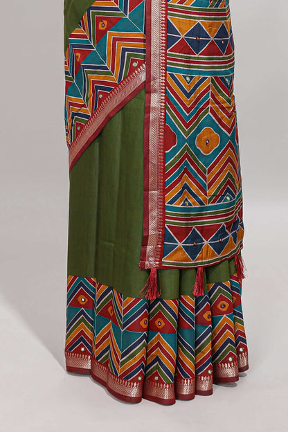 Green embroidery mirror work viscose georgette saree with contrast chevron design zari border and printed pallu