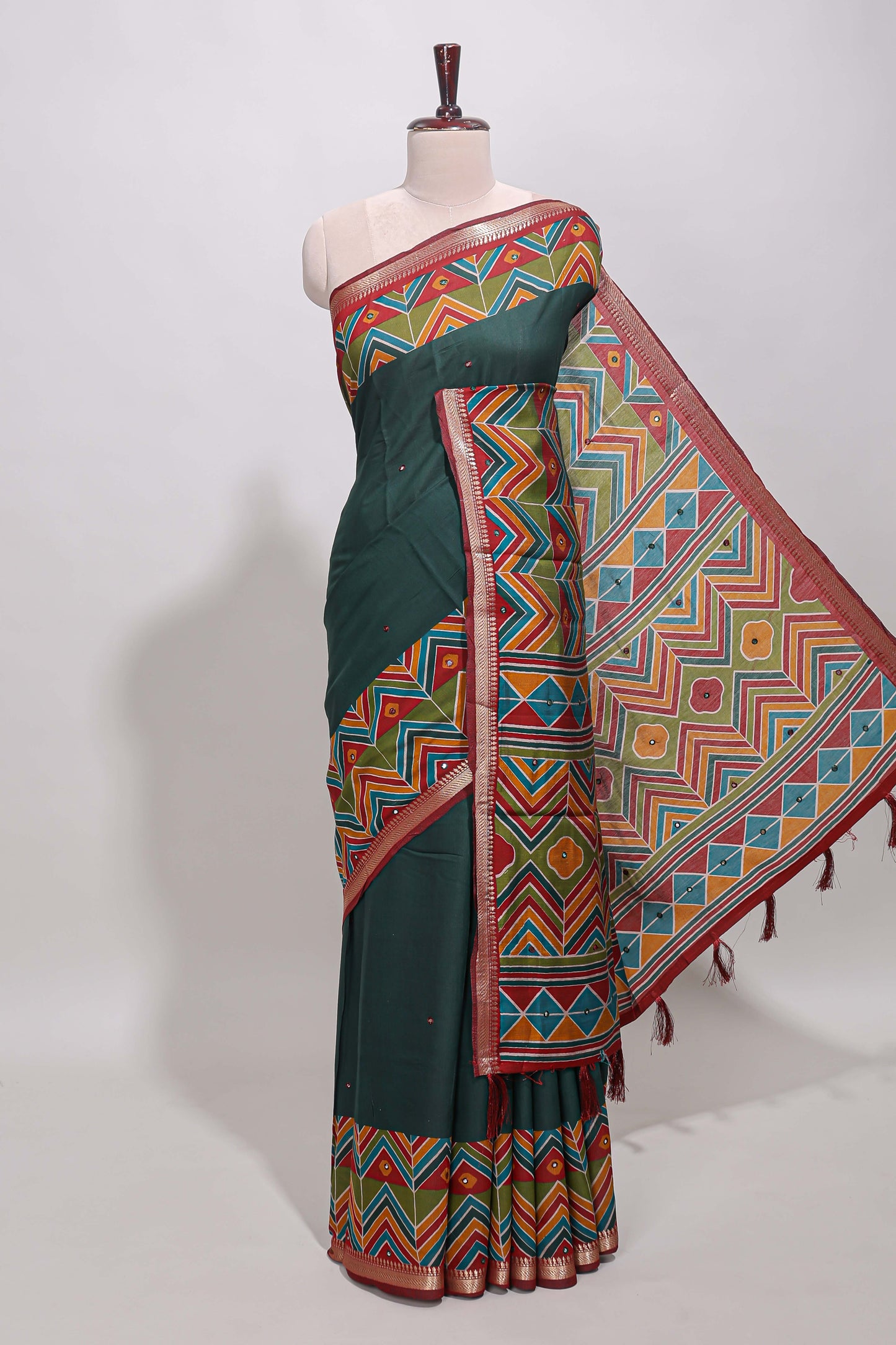 Green embroidery mirror work viscose georgette saree with contrast chevron design zari border and printed pallu