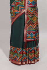 Green embroidery mirror work viscose georgette saree with contrast chevron design zari border and printed pallu