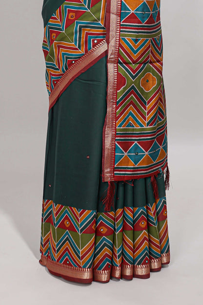 Green embroidery mirror work viscose georgette saree with contrast chevron design zari border and printed pallu