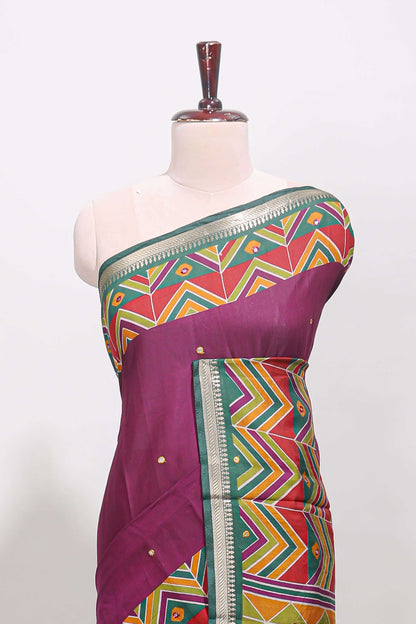 Purple embroidery mirror work viscose georgette saree with contrast chevron design zari border and printed pallu