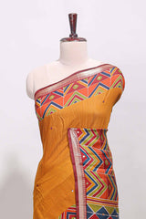 Mustard yellow embroidery mirror work viscose georgette saree with contrast chevron design zari border and printed pallu