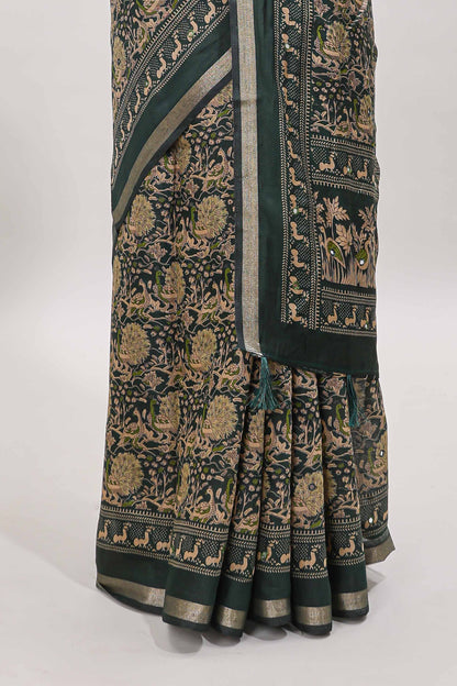 Green floral design mirror work viscose georgette saree with self zari border and printed blouse