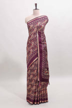 Purple floral design mirror work viscose georgette saree with self zari border and printed blouse