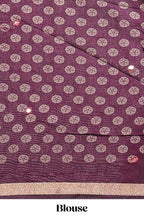 Purple floral design mirror work viscose georgette saree with self zari border and printed blouse