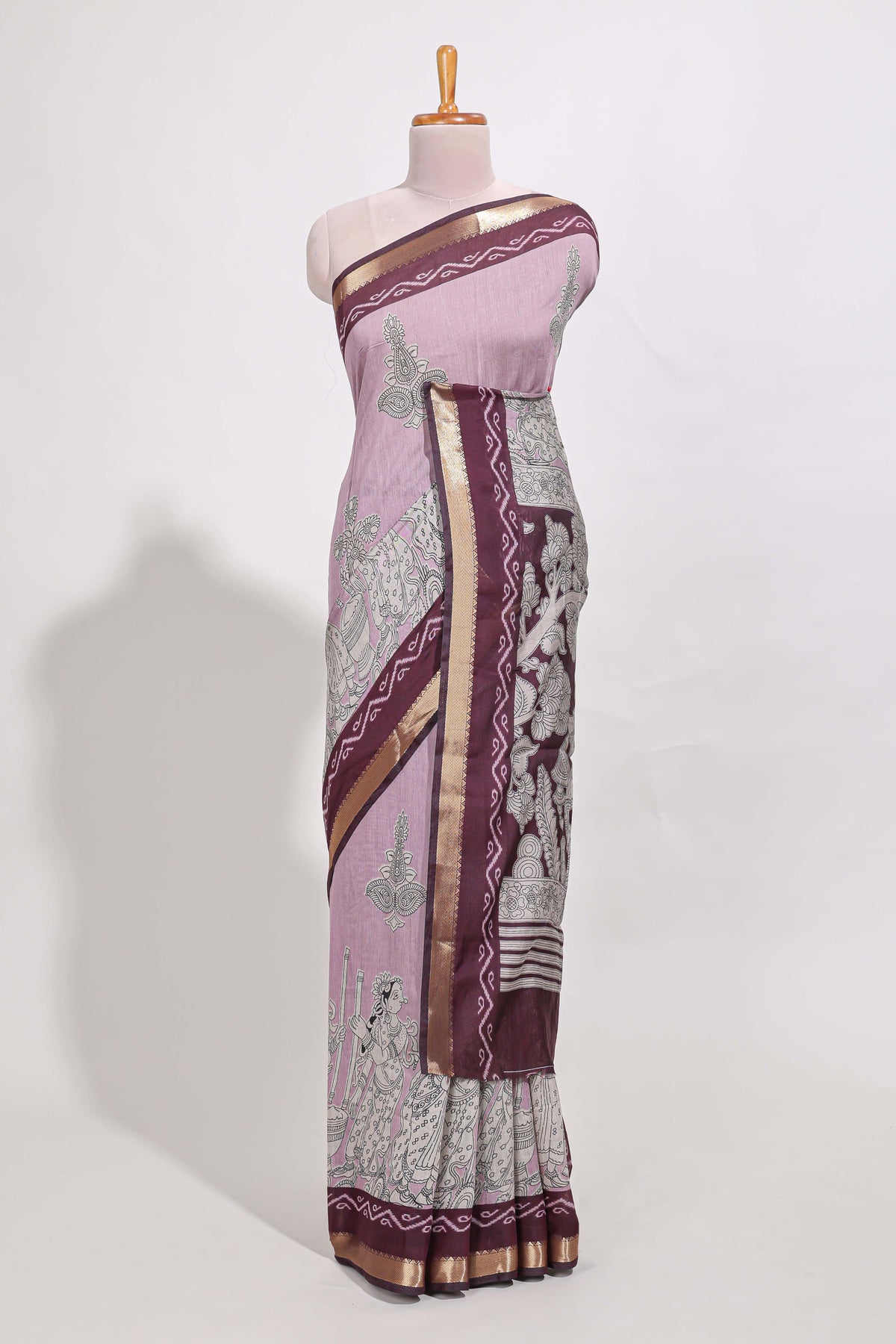 Lavender Mauve Viscose Georgette Saree All-over elegant ethnic detailing gold zari border and Statement pallu with artistic motifs with contrast printed blouse