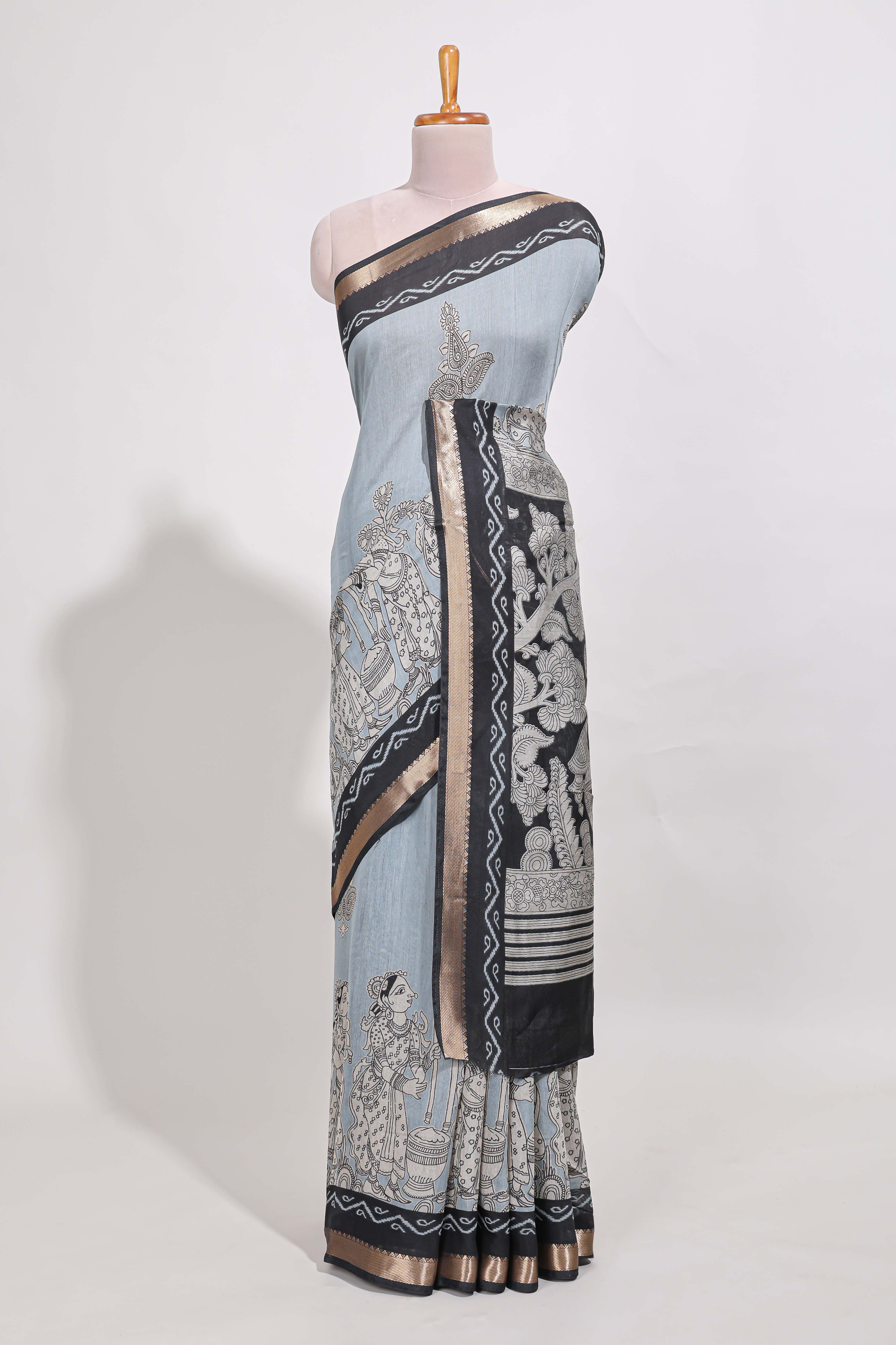 Powder Blue Viscose Georgette Saree All-over elegant ethnic detailing gold zari border and Statement pallu with artistic motifs with contrast printed blouse