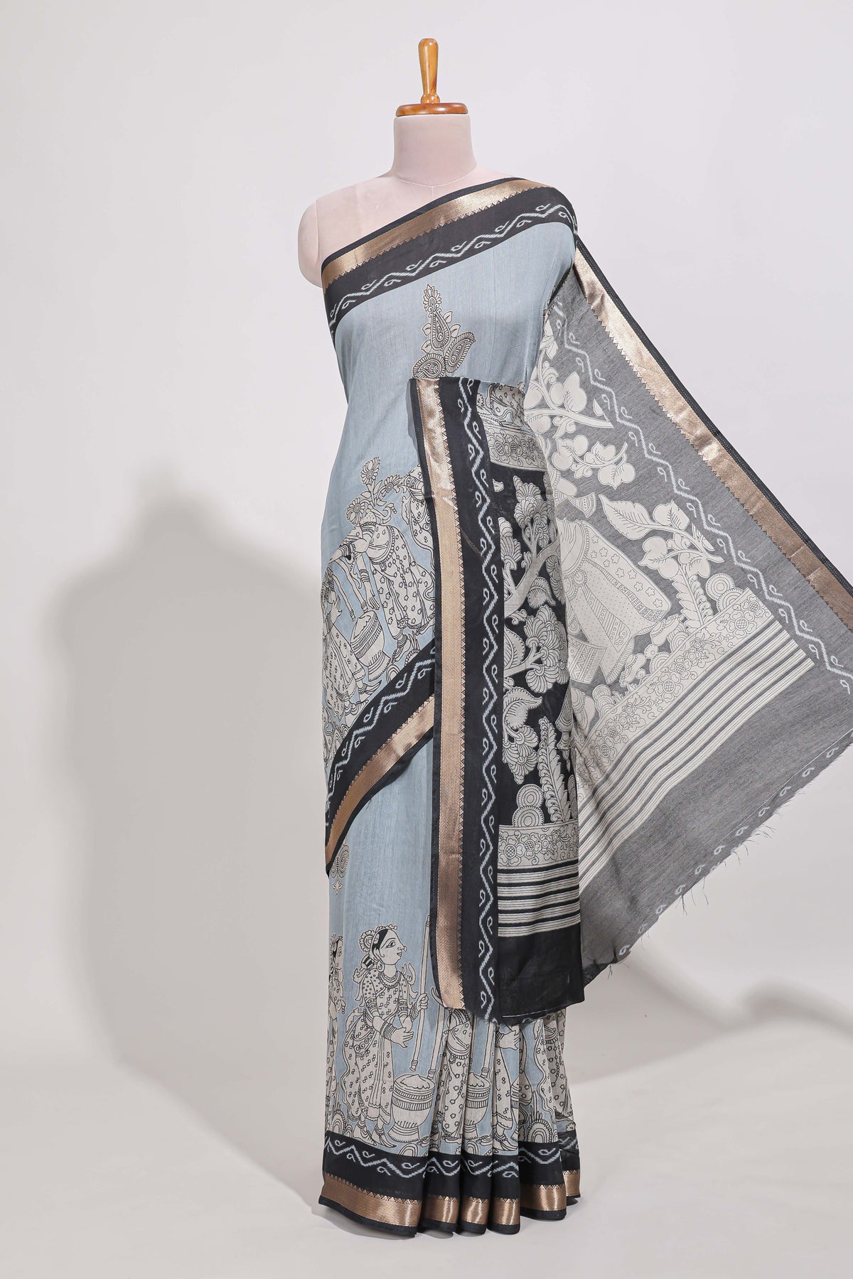 Powder Blue Viscose Georgette Saree All-over elegant ethnic detailing gold zari border and Statement pallu with artistic motifs with contrast printed blouse