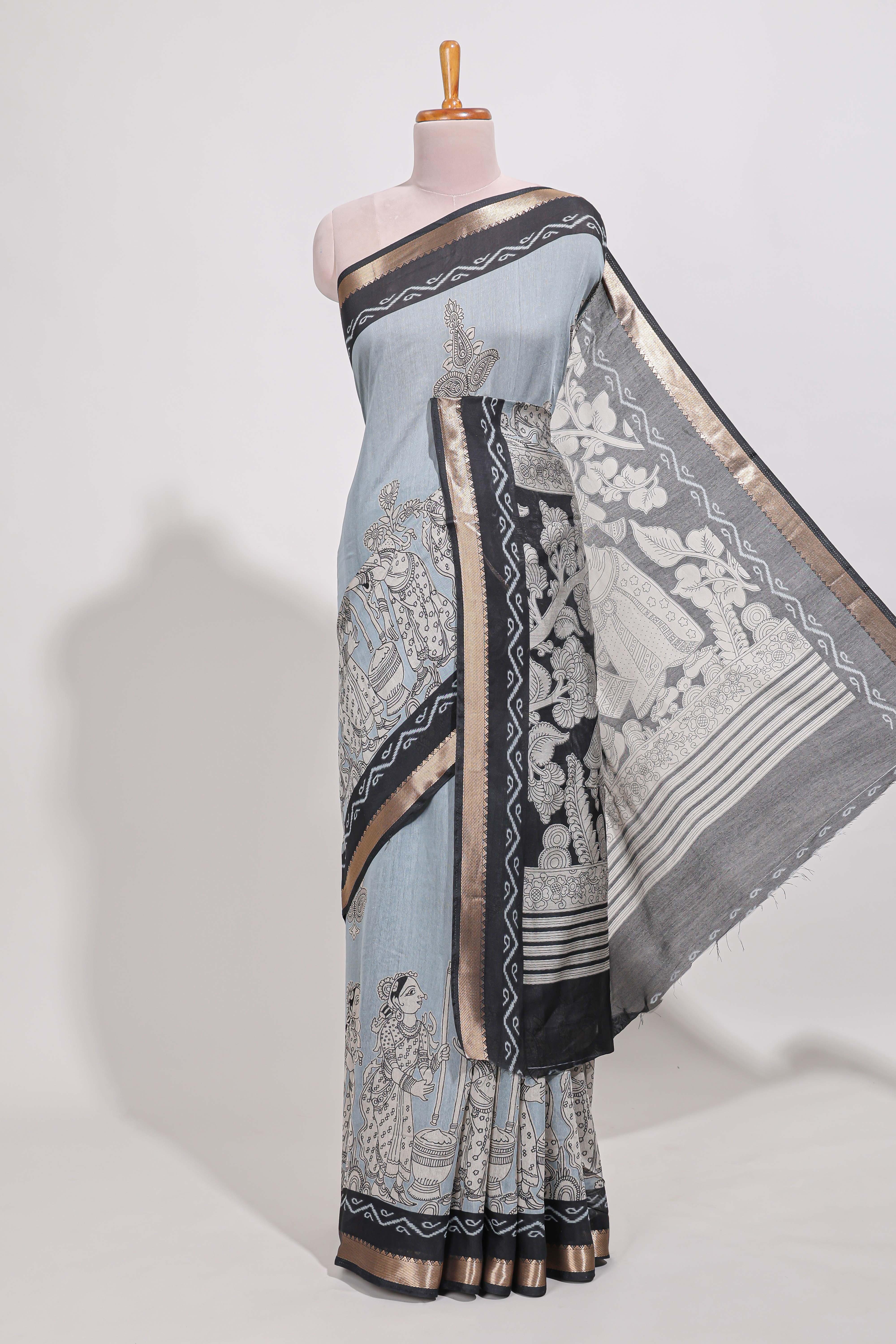 Powder Blue Viscose Georgette Saree All-over elegant ethnic detailing gold zari border and Statement pallu with artistic motifs with contrast printed blouse