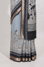 Powder Blue Viscose Georgette Saree All-over elegant ethnic detailing gold zari border and Statement pallu with artistic motifs with contrast printed blouse