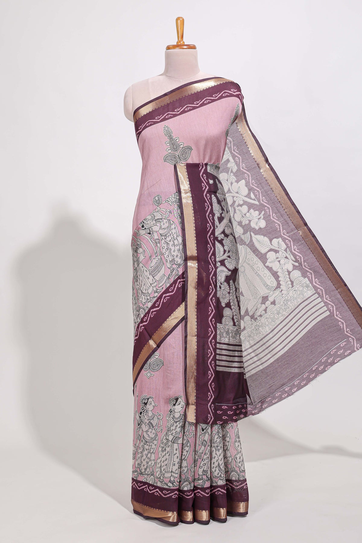 Rose Viscose Georgette Saree All-over elegant ethnic detailing gold zari border and Statement pallu with artistic motifs with contrast printed blouse