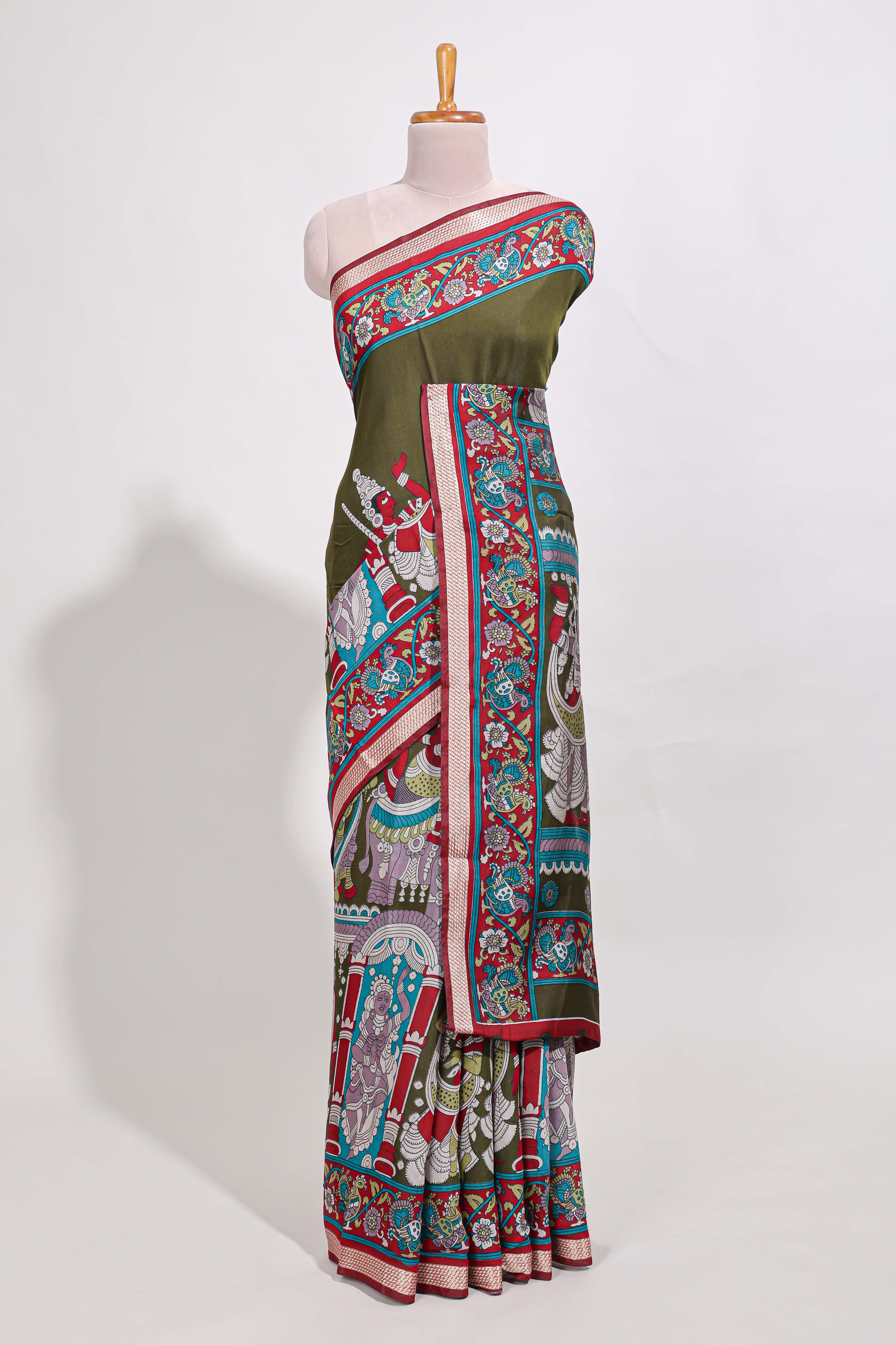 Olive Green viscose georgette saree Traditional Heritage Print with Ornate Printed Border and Detailed Printed Pallu with contrast Blouse