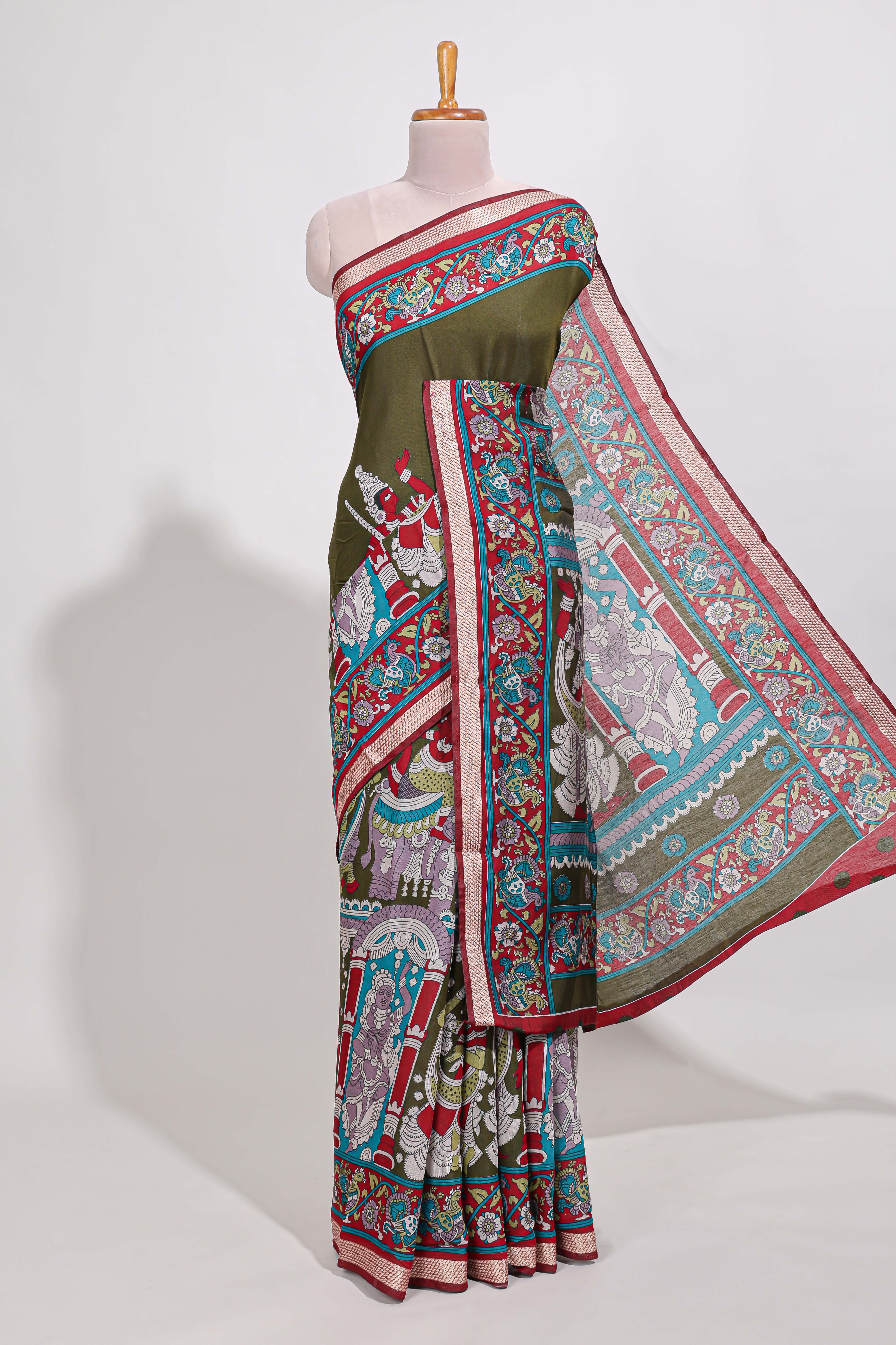 Olive Green viscose georgette saree Traditional Heritage Print with Ornate Printed Border and Detailed Printed Pallu with contrast Blouse