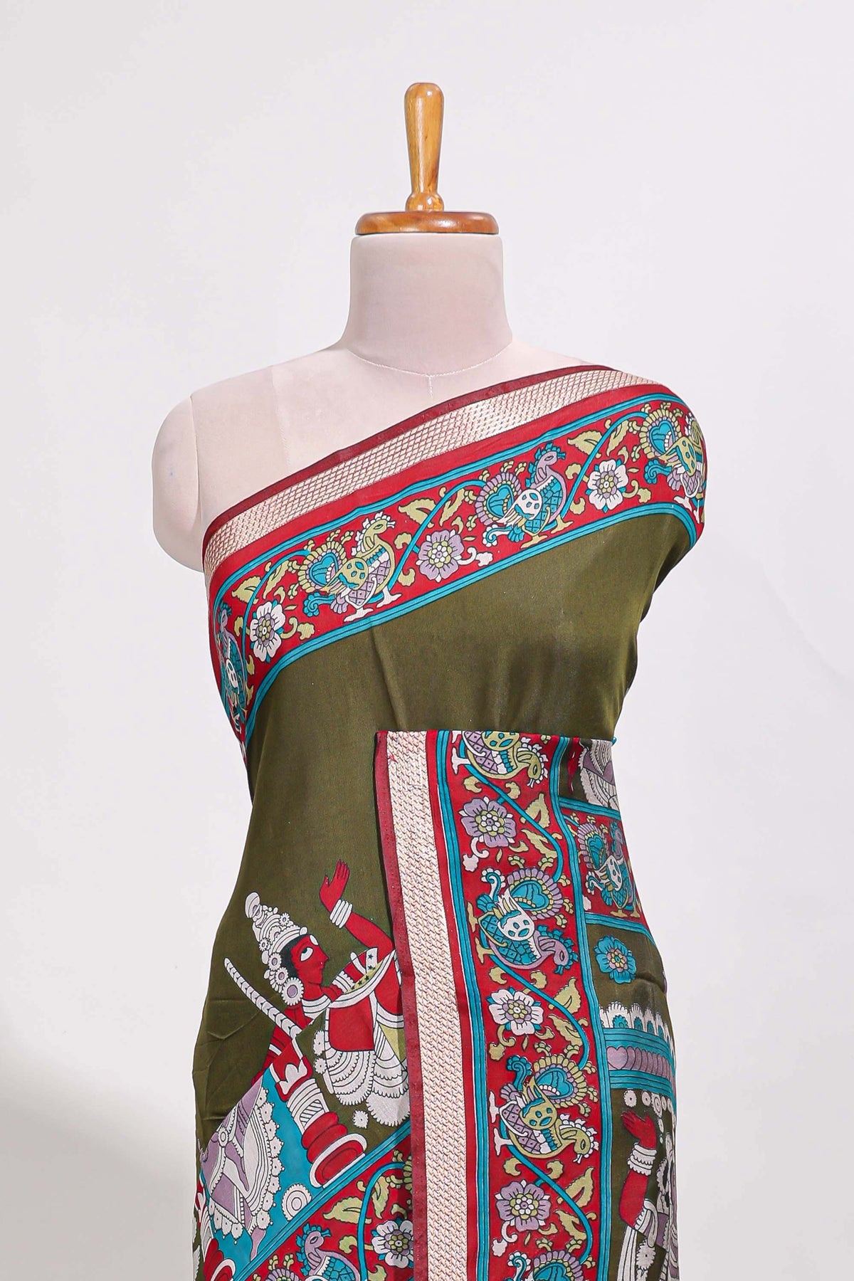 Olive Green viscose georgette saree Traditional Heritage Print with Ornate Printed Border and Detailed Printed Pallu with contrast Blouse