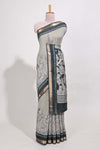 Grey colour viscose georgette saree All-over elegant ethnic detailing gold zari border and Statement pallu with artistic motifs with contrast printed blouse