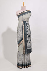 Grey colour viscose georgette saree All-over elegant ethnic detailing gold zari border and Statement pallu with artistic motifs with contrast printed blouse